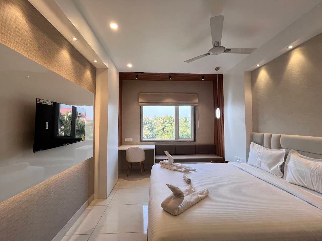 Elegant hotel room with serene garden view and premium furnishings